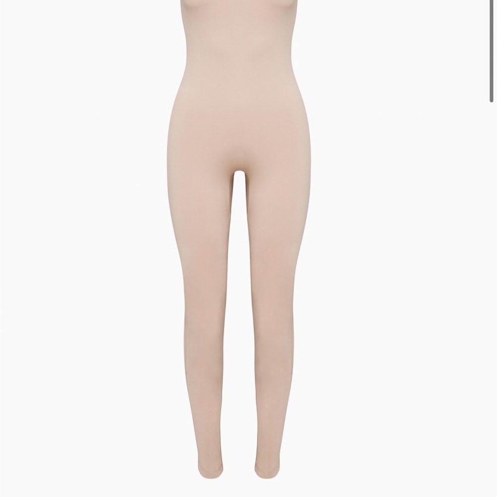 TNA TnAction jumpsuit in Mauve Taupe